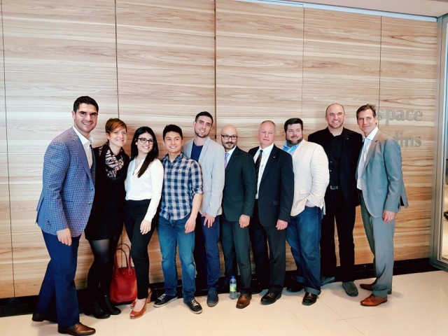 Innocité cohort taking a picture at the Desjardins Lab in Montreal.